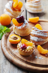 Sweet tarts with cherry and apricot