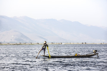 Naklejka premium legrowing fisherman at Inle lake