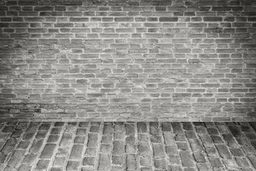 grunge background, red brick wall texture bright plaster wall and blocks road sidewalk 