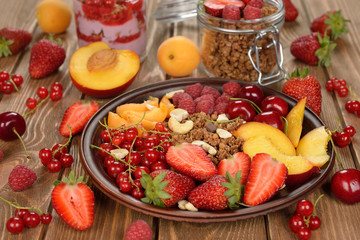 Fototapeta na wymiar Granola with berries and fruit