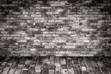 grunge background, red brick wall texture bright plaster wall and blocks road sidewalk 