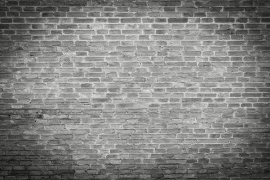 grunge background, red brick wall texture bright plaster wall and blocks road sidewalk 