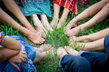 Feet of group of young girls in a circle