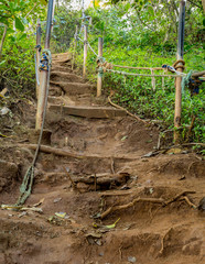 Fototapeta premium Steep climb on dirt path up hillside
