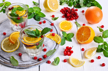 Drink with citrus and berries