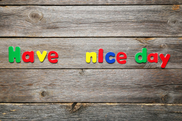 Have a nice day words made of colorful magnets