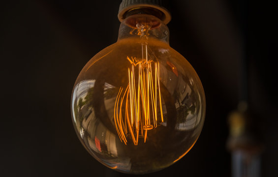 Orange light bulb  in coffee shop