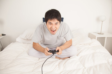 Man playing video games and shouting