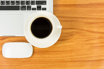Obraz na płótnie Canvas Notebook laptop and coffee cup