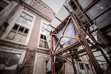 Old industrial factory destruction broken glass red wall