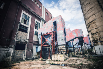 Old industrial factory destruction broken glass red wall