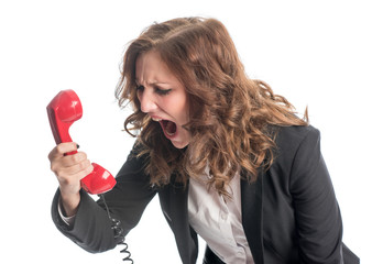 Geschäftsfrau schreit in den Telefonhörer