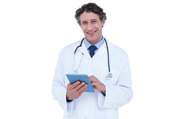 Doctor using his digital tablet