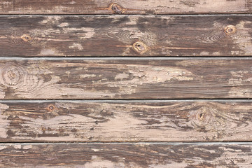 Brown peeling paint wooden desk texture.