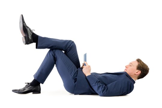 Businessman lying on the floor