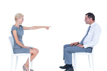 Obraz premium businesswoman pointing at businessman