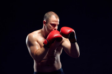 Fototapeta na wymiar Young Boxer boxing 