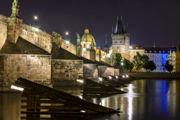 Charles Bridge at night in Prague, Czech Republic.