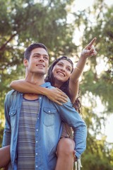 Cute couple smiling in the park