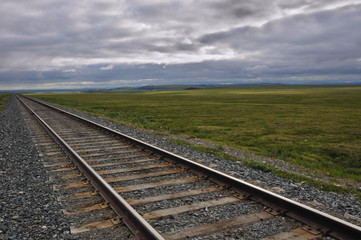 Fototapeta na wymiar A railway in the tundra to Bovanenkovo gas-field (Yamal, Russia)