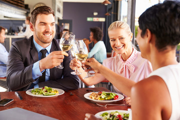 Group of business people at lunch in a restaurant