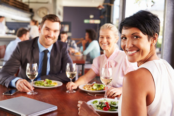 Group of business people at lunch in a restaurant