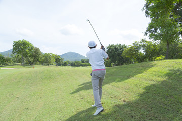 widely golf  course in very nice day summer with player