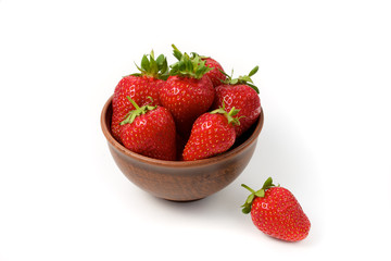 strawberry in a bowl on a white background