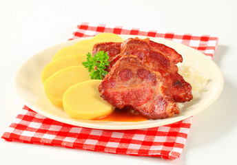 Pork with potato dumplings and sauerkraut