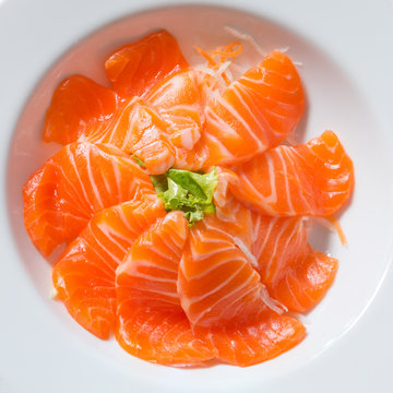 fresh sashimi saimon on wood background 