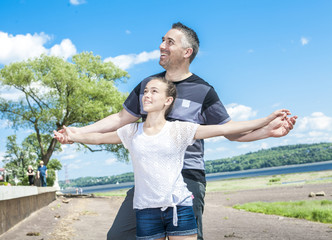 Father and daughter have fun outside