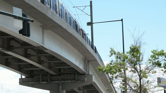 Commuter train on an overpass
