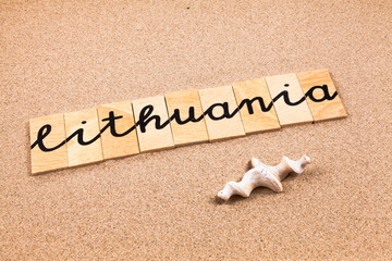 Words formed from small pieces of wood containing a sun and beach tourist destination, Lithuania