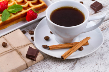 Cup of coffee, Belgium waffle and strawberries