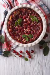 Clafoutis with cherry vertical top view
