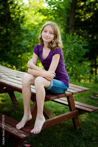 Beautiful Blue Eyed Teen Girl Outdoors In The Summer