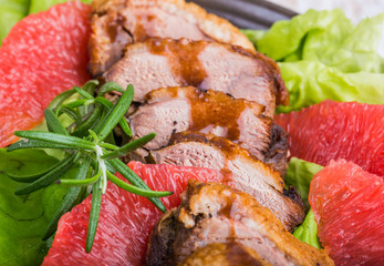 Roast duck breast with lettuce and grapefruit
