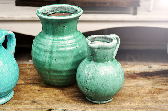 Old Ceramic Jug On The Vintage Table