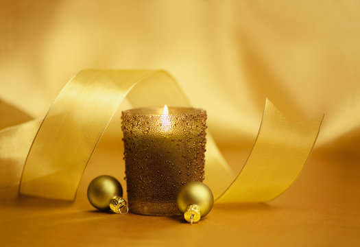 Christmas Candle & Gold Ribbon With Holiday Decor