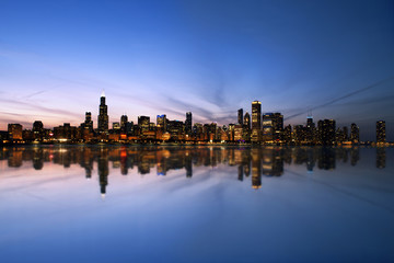Fototapeta na wymiar Chicago Skyline Reflecting On Lake Michigan 