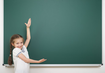 Schoolgirl near school board