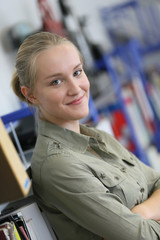 Student girl standing in school library