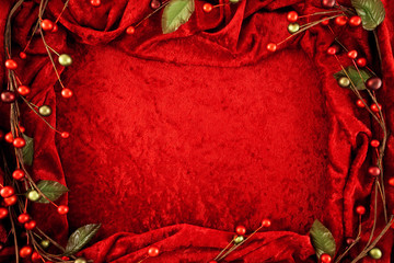 Christmas garland border & crushed red velvet background