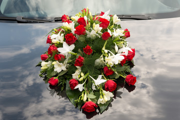 Wedding bouquet on car