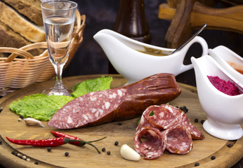 sausage on a wooden plate in a restaurant