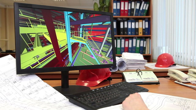 Time lapse of designer turning 3d model and pointing hand at pc monitor