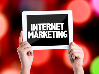 Tablet pc with text Internet Marketing with bokeh background