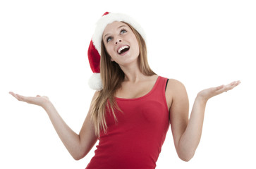 Young happy girl in Christmas hat.