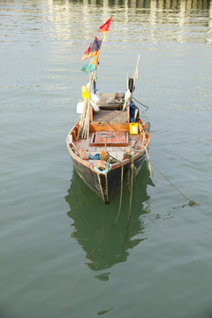 Stock Photo - fishing boat on sea background