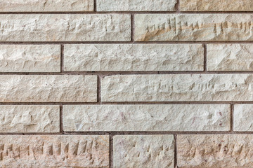 texture of yellow-brown rough brick wall